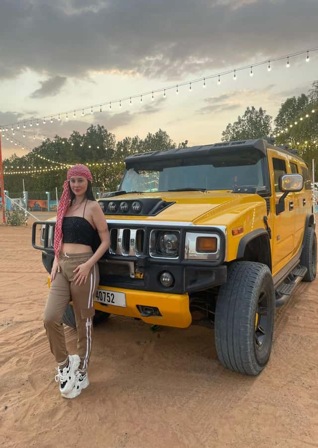 Dubai Hummer Safari Adventure & Traditional Dress Photoshoot - Sandboarding and the camel ride, the two classic activities you can actually enjoy