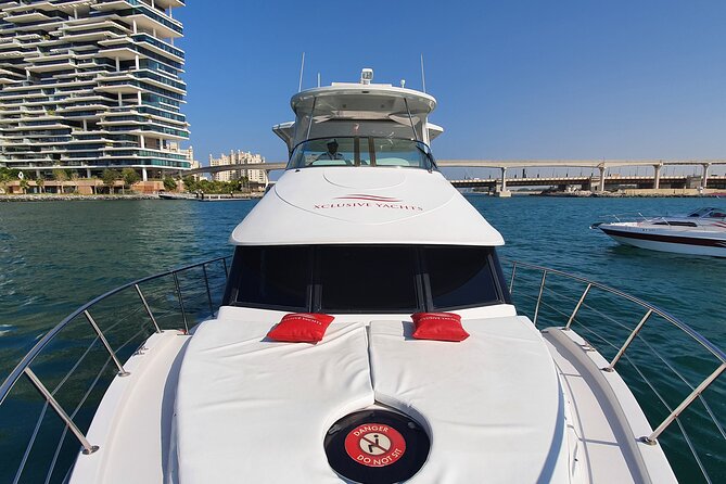 Dubai Marina 1hr Yacht tour with Drinks - Stop 3: JBR waterfront views, 40 towers, and that classic beach skyline