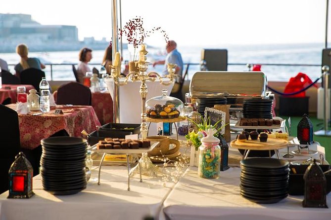 Dubai Marina Dinner Cruise with Live Music & Open Bar - The dinner setup: buffet, live pasta, and seating that stays put