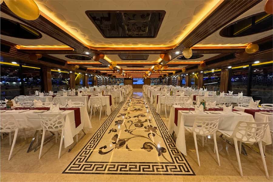 Dubai: Mega Yacht Dinner Cruise with Buffet - Live tanoura, aerial acts, and DJ music on open decks