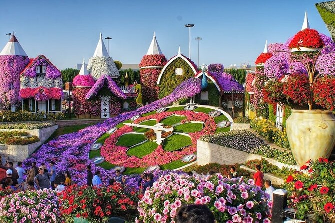 Dubai: Miracle Garden Tickets with Round-trip Transfer - Inside Miracle Garden: themed gardens, floral structures, and seating breaks