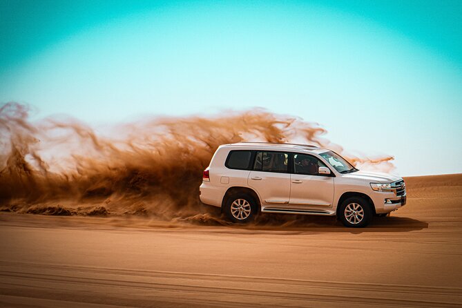 Dubai Morning Desert Safari with Quad Biking & More Activities - Sandboarding: the easy win for non-quad riders