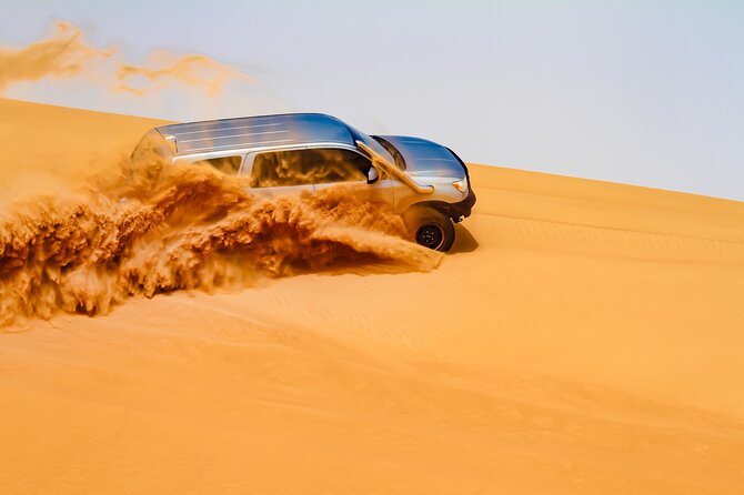 Dubai Morning Evening Desert Safari,Sand boarding and Camel ride - Sandboarding: The Laugh-It-Out Part of the Safari