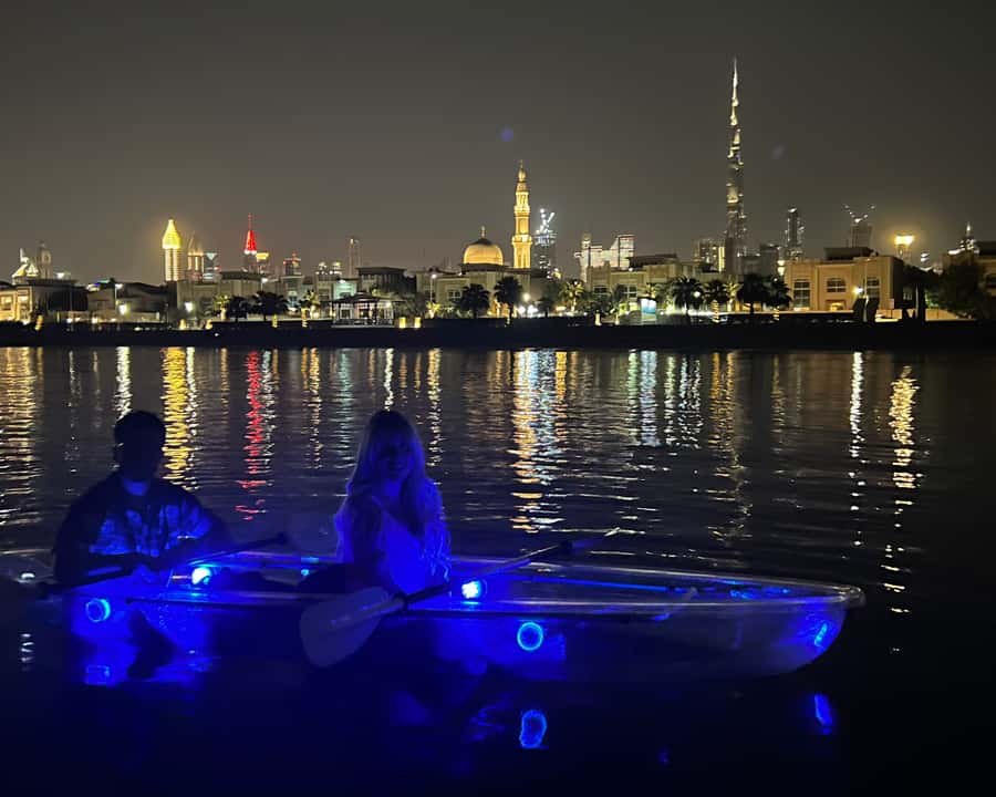Dubai: Night Kayaking Tour - A Transparent Kayak and a Dubai Skyline at Night