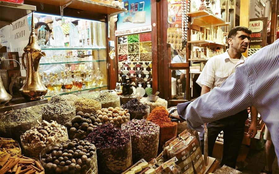 Dubai: Old City Walking Tour with Abra Ride - Al Seef and Al Bastakiya: old city streets with photo stops and clear context