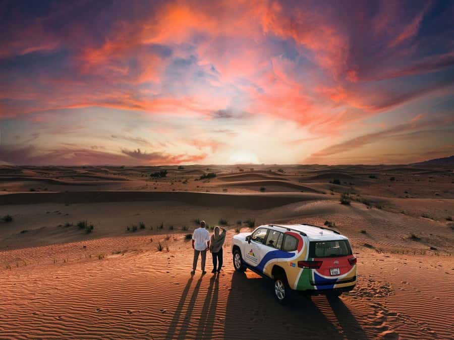 Dubai: Premium Desert Safari, Camel Ride, BBQ & Sandboarding - Getting From Your Hotel to the Red Dunes in a 4x4