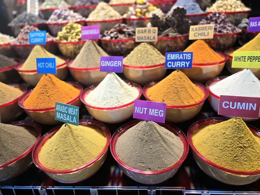 Dubai: Premium Old Town, Street Food, Souks & Boat Ride Tour - Spice Souk in Full Color: Smells, Colors, and How to Shop