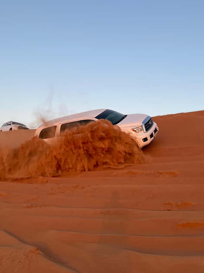 Dubai: Premium Red Dune Safari with Sandboarding & BBQ - How Pickup and the Drive Into Lahbab Desert Shape the Night