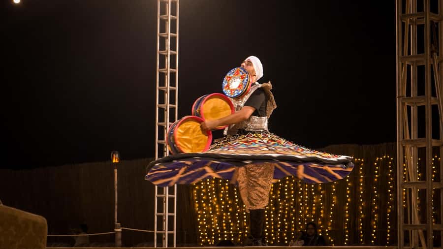 Dubai: Premium Red Dune Safari with Sandboarding & BBQ - Camel Ride and Desert Camp Arrival: The Slower Pace After the Rush