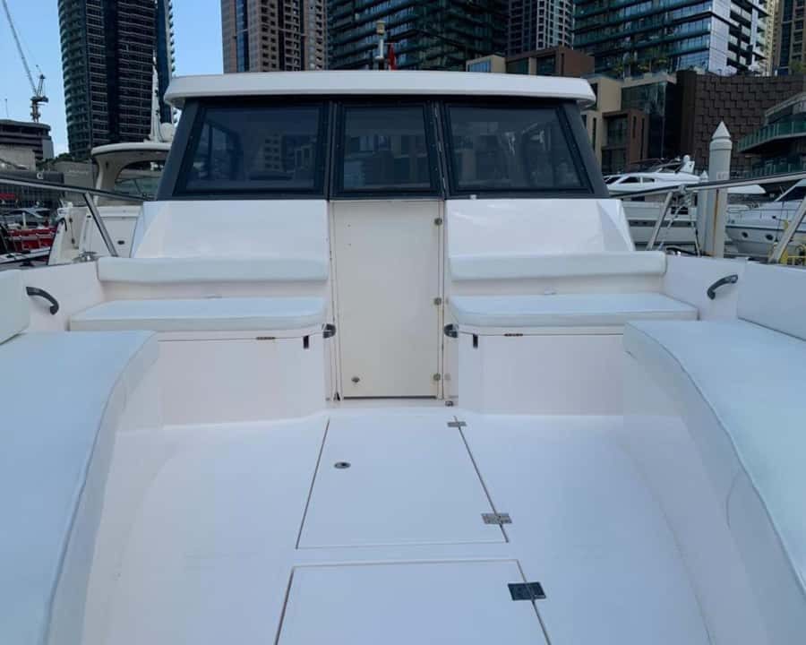 Dubai: Private Boat Cruise from Dubai Marina - Swim-platform shower, music via Bluetooth, and onboard comfort details that add up