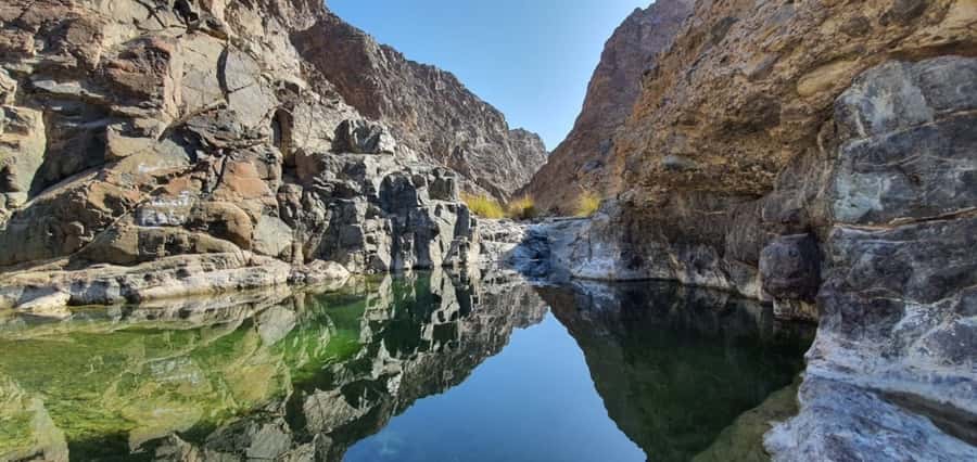Dubai: Private Desert Day Tour and Wadi Shawka Pool Visit - Sharjah moments: quick photo stop before the dunes