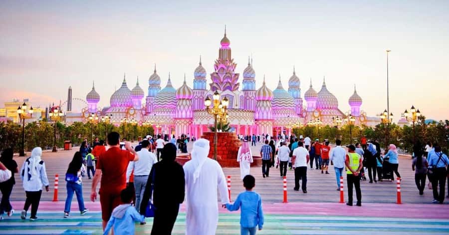 Dubai: Private Miracle Garden & Global Village Trip - Global Village, festival park energy with rides and pavilions