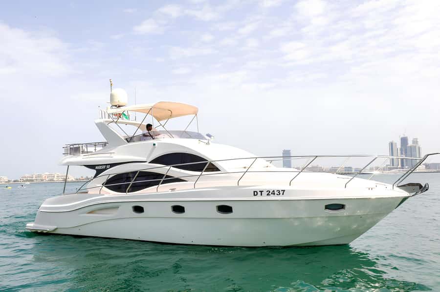 Dubai: Private Yacht Tour Experience with Soft Drinks - Entering Dubai Harbor, then stepping onto a real yacht