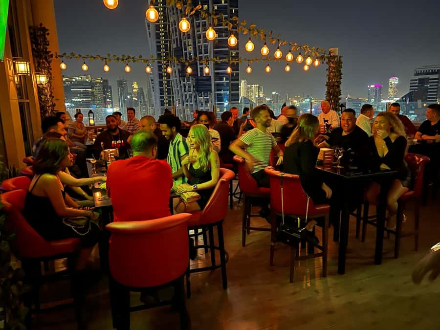 Dubai: Pub Crawl Nightlife Tour - The Party Bus Segment: AC, Karaoke, and Custom Music