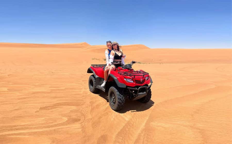 Dubai: Quad Bike, Dune Buggy, and Sandboarding Experience - Red dunes, route guidance, and that adrenaline payoff