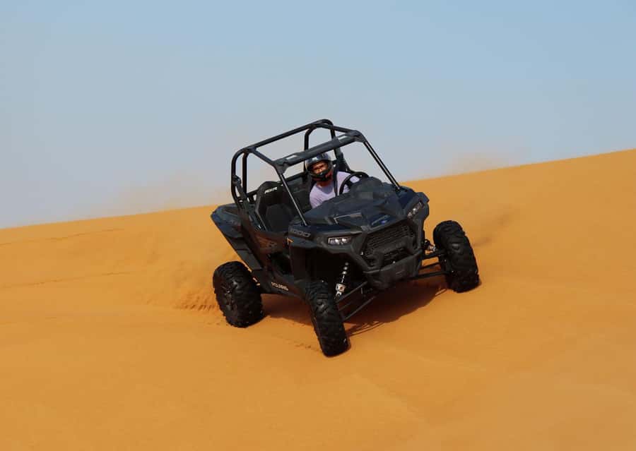 Dubai: Quad Bike, Dune Buggy, and Sandboarding Experience - 15 minutes on camelback: a traditional pause that stays short