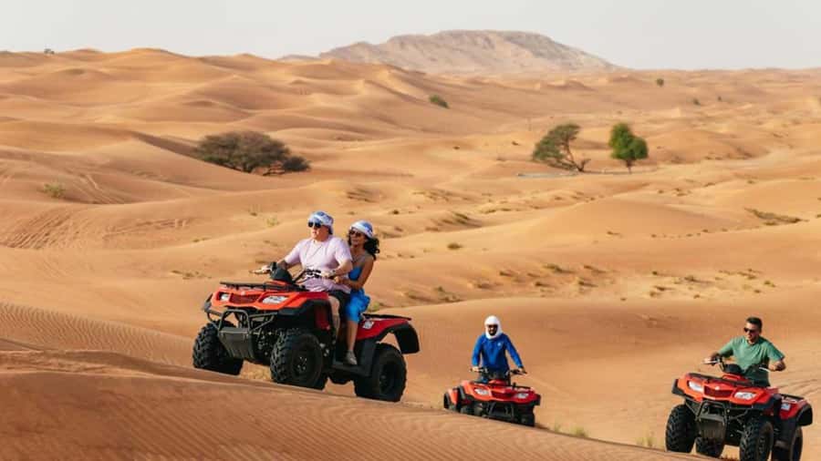 Dubai: Quad Bike, Dune Buggy, and Sandboarding Experience - Sandboarding on Dubai’s red dunes for about 30 minutes