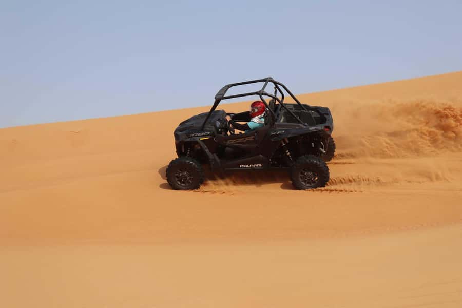 Dubai: Quad Bike, Dune Buggy, and Sandboarding Experience - A guided photo stop in the heart of the desert