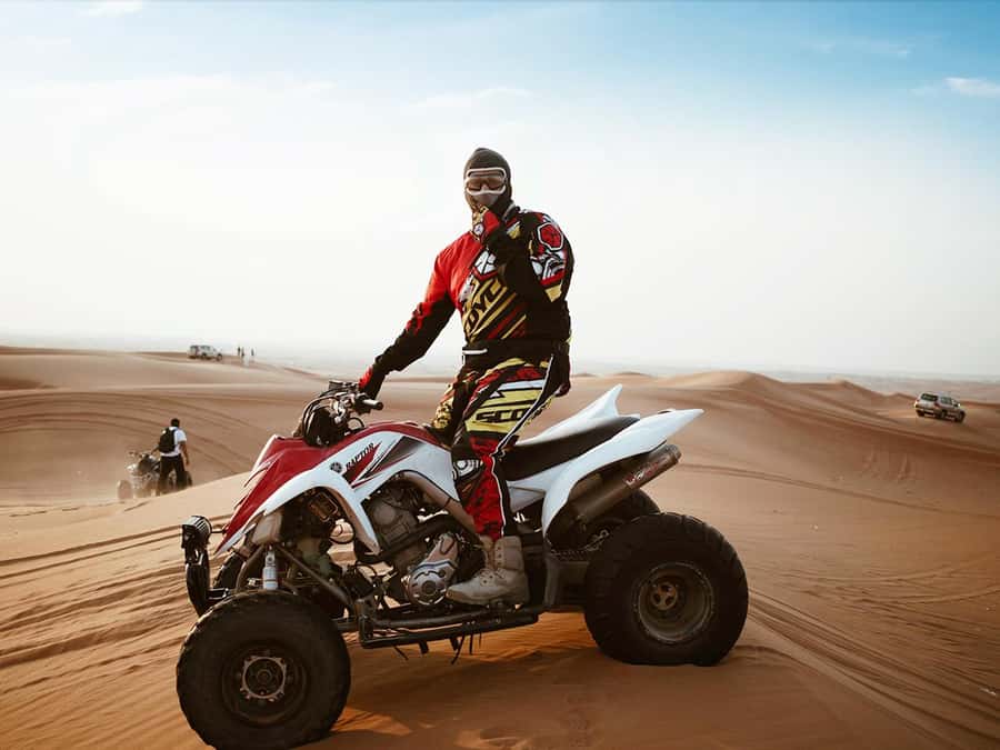 Dubai: Quad Bike or Dune Buggy Adventure & Optional Transfer - The flow of the day: pickup, safety briefing, dunes, then camp