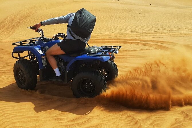 Dubai: Quad Bike Safari, Camels, & Camp with BBQ Dinner - Quick Hits Before You Go
