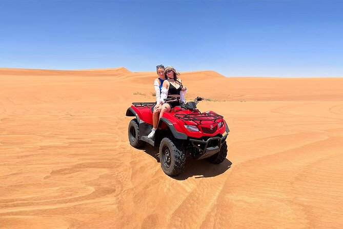 Dubai: Quad Bike Safari, Camels, & Camp with BBQ Dinner - From Your Hotel to the Desert Meeting Point