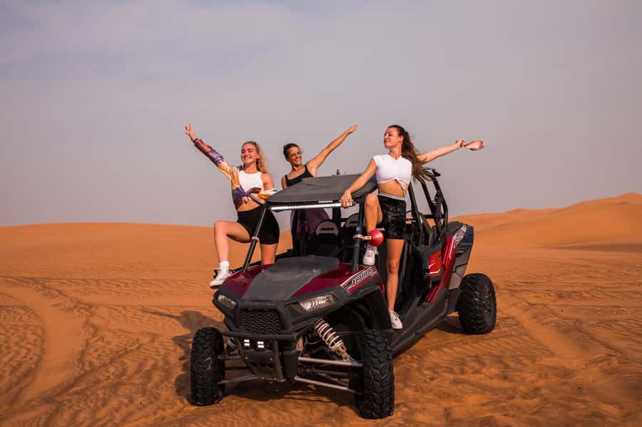Dubai: Red Dune Desert Safari, Quad Bike, Camels, and BBQ - Quad biking in the sand: fun, but read the rules first