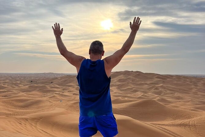Dubai Red Dune Safari with Bedouin BBQ Dinner & Hotel Transfers - Tanoura, belly dance, fire show, and guided stargazing
