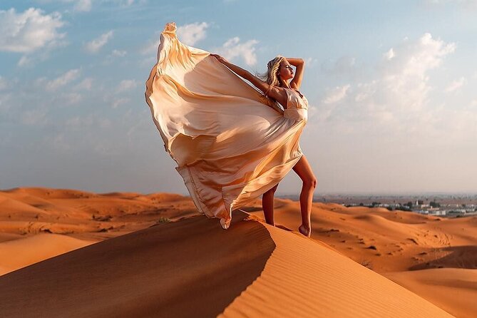 Dubai: Red Dunes Desert Safari, Camel ride, Sandboard, Quad Bike - Camel rides and sandboarding, plus optional quad biking