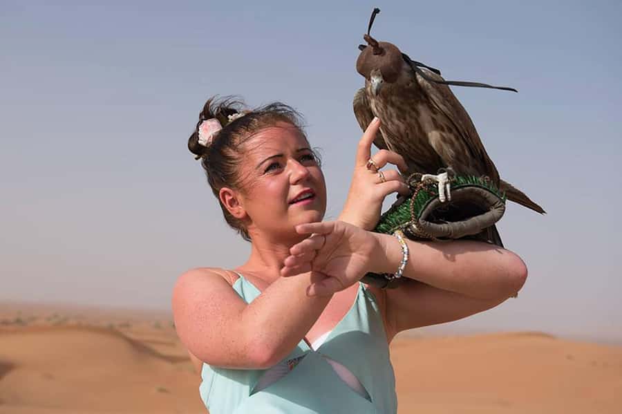 Dubai: Red Dunes Desert Safari with Premium Camp BBQ & Shows - Premium camp welcome: gahwa, dates, henna, and Arabic dress photos