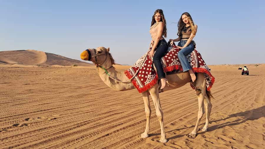 Dubai: Red Dunes Evening Quad Bike, Dune Blast with BBQ - 45 minutes in Lahbab: safety briefing, camel time, and quick desert fun
