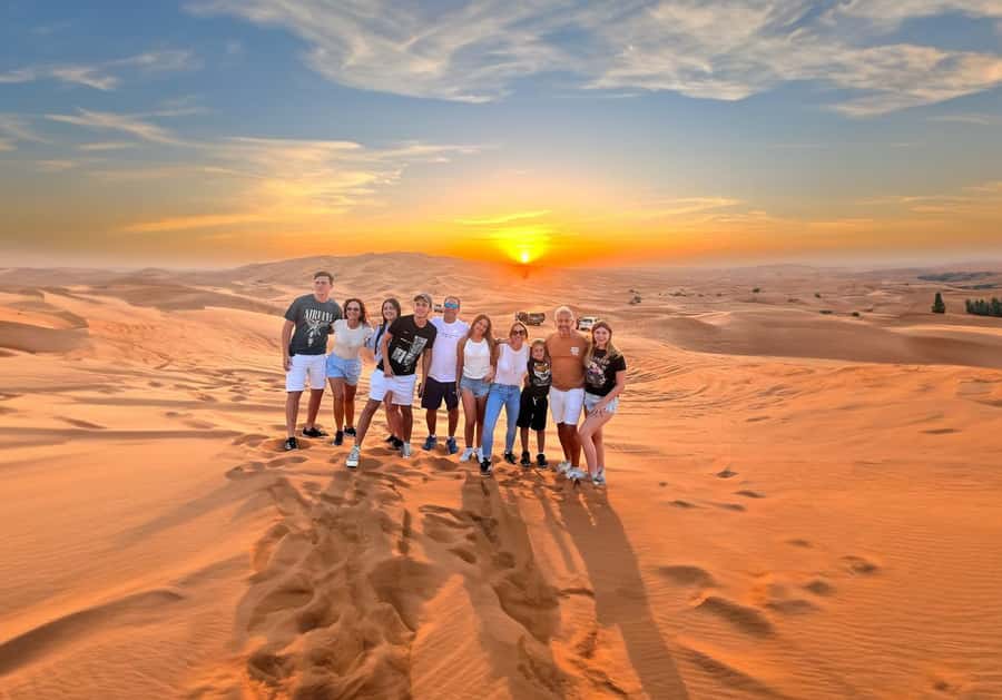 Dubai: Red Dunes Evening Quad Bike, Dune Blast with BBQ - Sandboarding and sunset or sunrise photo moments at the desert edge
