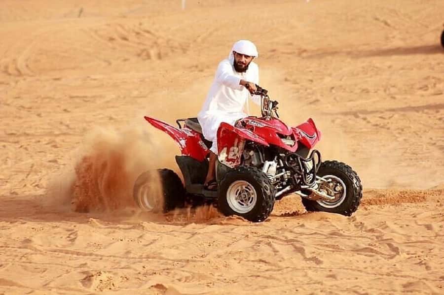 Dubai: Red Dunes Evening Quad Bike, Dune Blast with BBQ - Price and value at around $29 per person