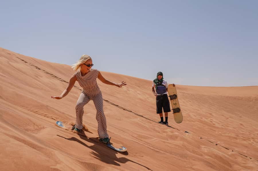 Dubai: Red Dunes Quad Bike, Dune Buggy, Camel & Refreshments - Camel Ride in Open Desert: Short, Traditional, and Surprisingly Fun
