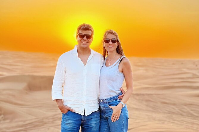 Dubai Red Dunes Safari, ATV, Camel ride, BBQ at Desert Camp - From dunes to camp: the welcome, camel ride, and henna before dinner