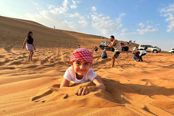 Dubai: Red Dunes, Sandsurf, Camel Ride, BBQ Dinner at Desert Camp - Dune Bashing and Sandsurf: Choose Your Comfort Level Before the Ride