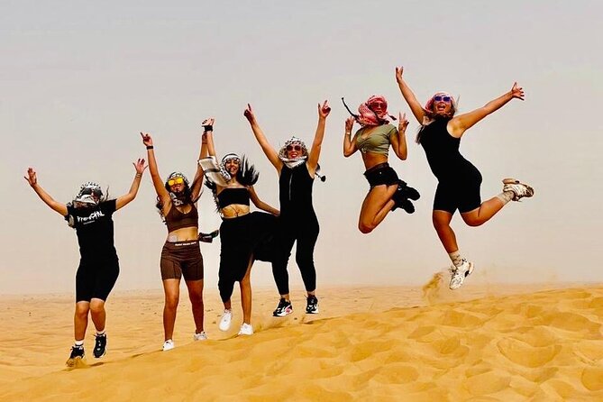 Dubai Red Dunes with Sandboarding, Camel Ride, Falcon & VIP Camp - Falcon photo, camel ride, and sunset photos without the rush