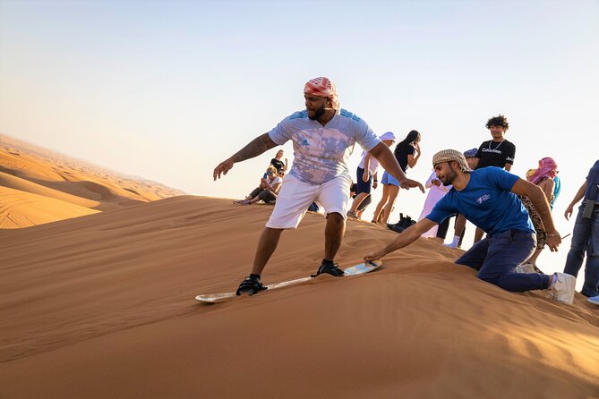 Dubai Red Dunes with Sandboarding, Camel Ride, Falcon & VIP Camp - Dune bashing and sandboarding: the action is the main event