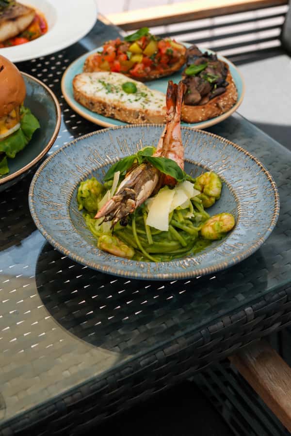 Dubai: Riva Beach Club Golden Hour Beachside - What’s Included: 3 Courses, Beachside Access, and Unlimited Drinks