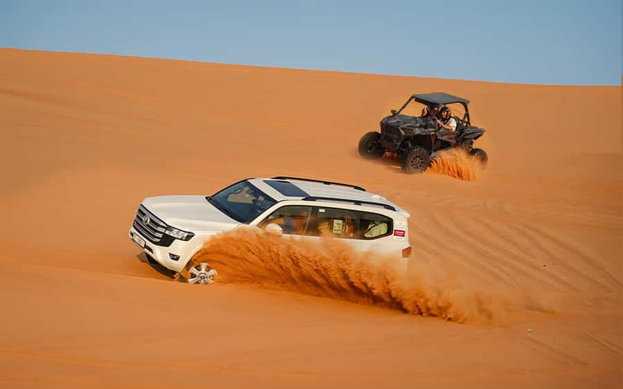 Dubai: Sandboarding, Camel Ride and Red Dune Bashing - Dune bashing: the steep climbs and controlled drops