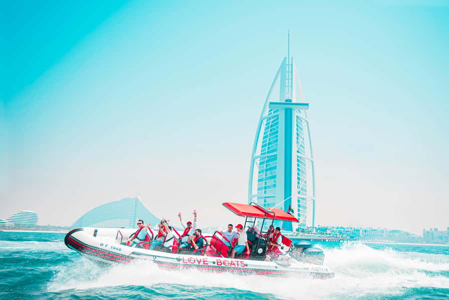 Dubai: Sightseeing Speedboat Tour with Live Tour Guide - Bluewaters and Ain Dubai: The Sea-Level Landmarks