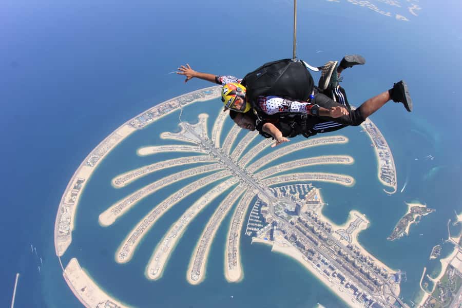 Dubai: Skydive at The Palm with Photos, Video & Yacht Tour - Inside the aircraft: harnessed, briefed, then up fast