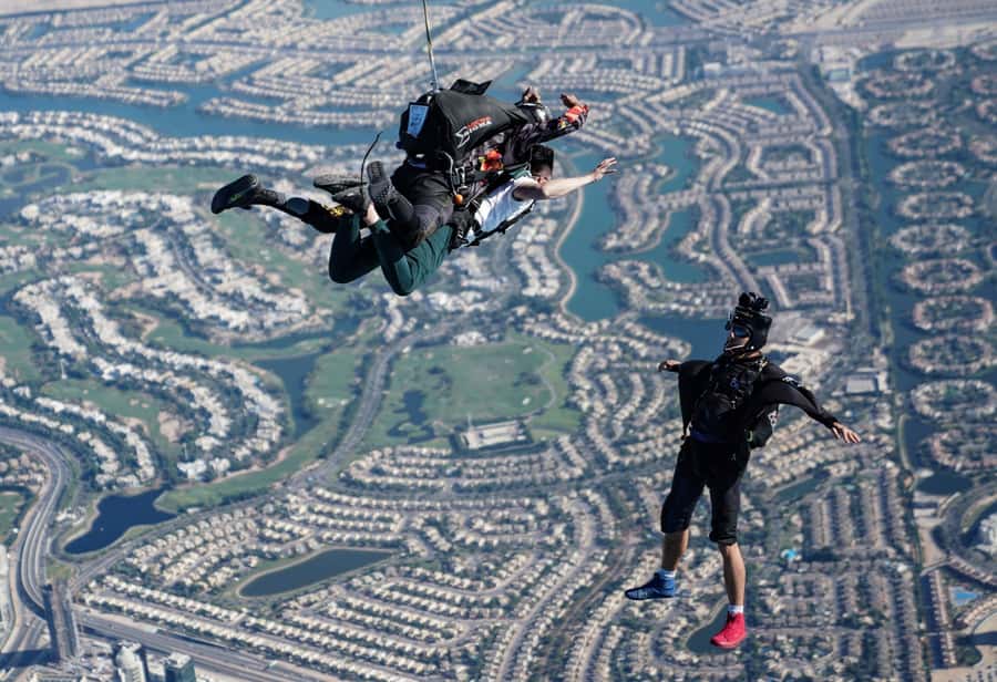 Dubai: Skydive at The Palm with Photos, Video & Yacht Tour - Parachute ride and views: the part you remember later