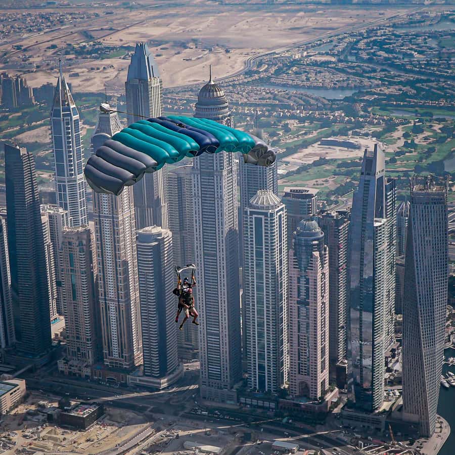 Dubai: Skydive at The Palm with Photos, Video & Yacht Tour - What to wear, what to bring, and what not to risk