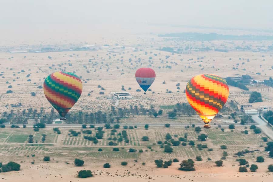 Dubai: Sunrise Balloon Flight with Camel Ride & Breakfast - Up you go: Sunrise views over 4,000 feet of Dubai desert