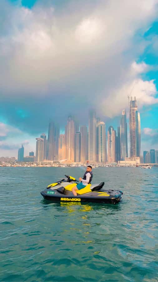 Dubai: Sunrise Jetski Tour with Guide and Photos - Ain Dubai Photo Stop: The Wheel Looks Best When the Light Is Soft