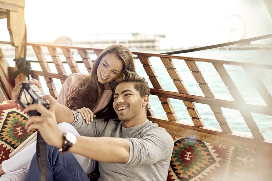 Dubai: Sunset Cruise on Traditional Boat & Emirati High Tea - The Cruise Route: Dubai Canal Views, Bird Sanctuary, and Dhow Yards