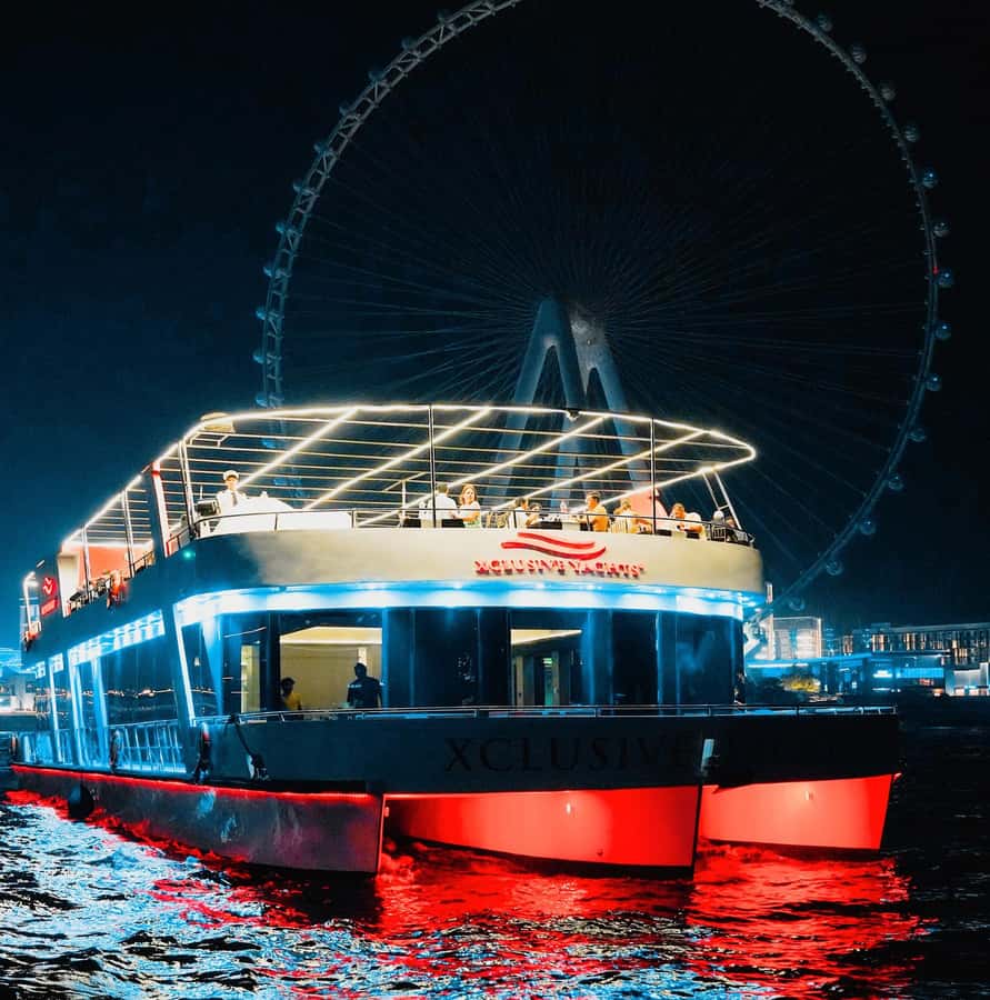 Dubai: Sunset or Dinner Cruise with Live Music & Open Bar - Cruise Sights in 90 Minutes: Dubai Marina, Ain Dubai, and JBR at Night