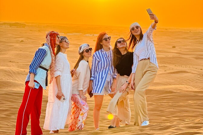 Dubai Sunset Red Dune Desert Safari, Sandboarding and Camel Ride - Dune bashing in the red sand with an expert driver