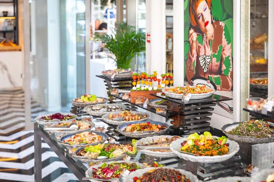 Dubai: The Palm Saturday Brunch with Unlimited Food & Drinks - Dessert room power move: donut wall and chocolate fountain
