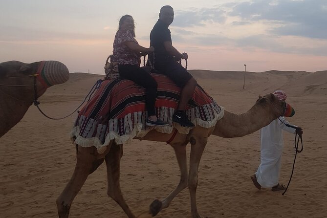 Dubai: Unique SUNSET 4WD Red Dunes Safari - Desert Camp Evening: BBQ Buffet, Belly Dance, Henna, and Shisha